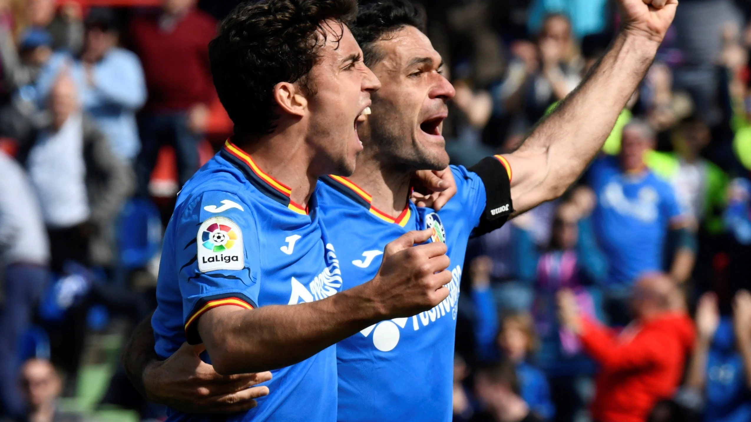 Jaime Mate y Jorge Molina celebran un gol ante el Rayo