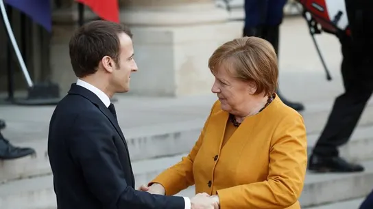 Emmanuel Macron y Angela Merkel Emmanuel Macron y Angela Merkel