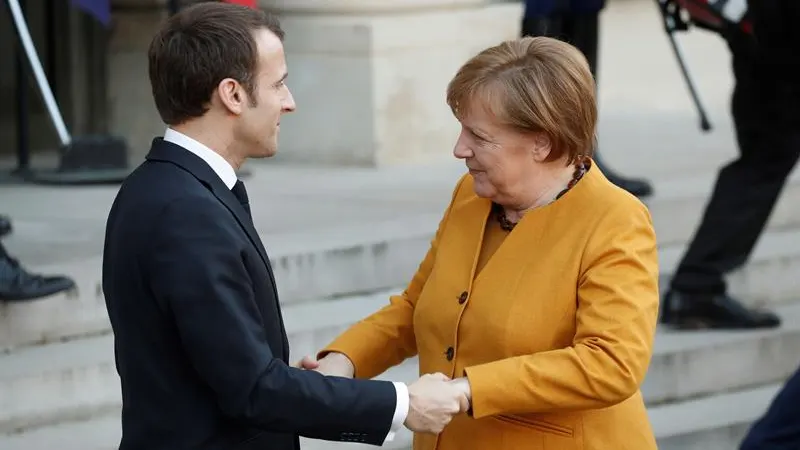 Emmanuel Macron y Angela Merkel