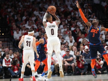 El triplazo de Damian Lillard El triplazo de Damian Lillard