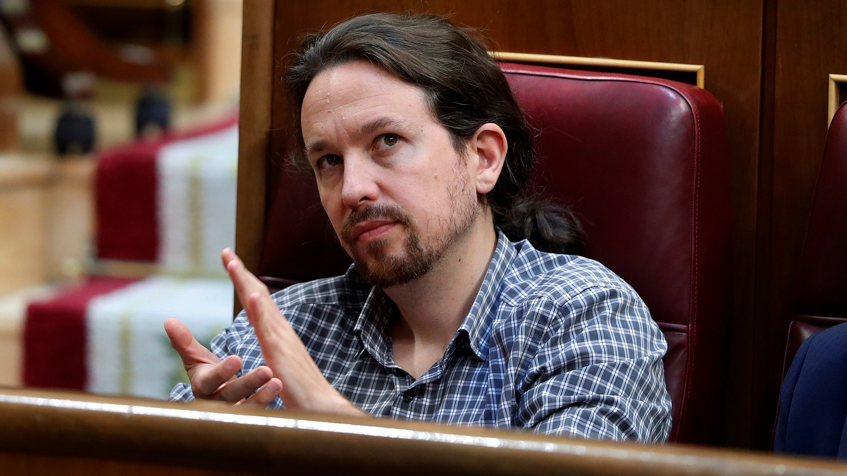 El secretario general de Podemos Pablo Iglesias, en el hemiciclo del Congreso en la primera jornada del debate de investidura