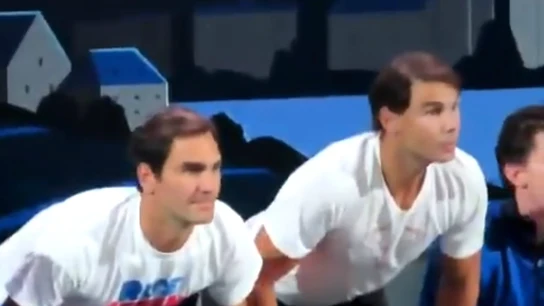 Federer y Nadal, en un partido de tenis Federer y Nadal, en un partido de tenis