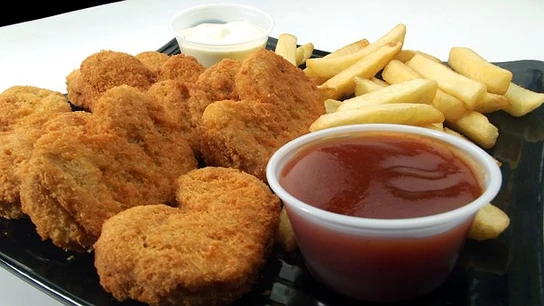 Imagen de archivo de unos nuggets de pollo Imagen de archivo de unos nuggets de pollo