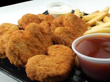 Imagen de archivo de unos nuggets de pollo Imagen de archivo de unos nuggets de pollo