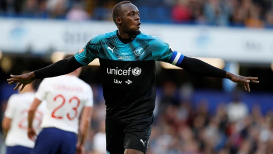 Usain Bolt, celebrando un gol en un partido benéfico Usain Bolt, celebrando un gol en un partido benéfico