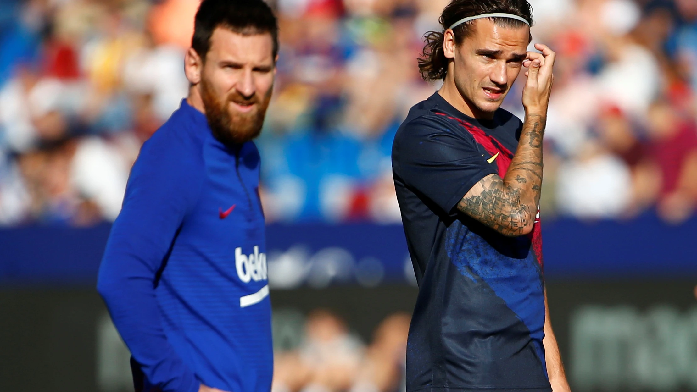 Leo Messi y Griezmann, antes de un partido con el Barça