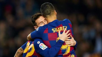 Luis Suárez y Leo Messi celebran un gol del Barça