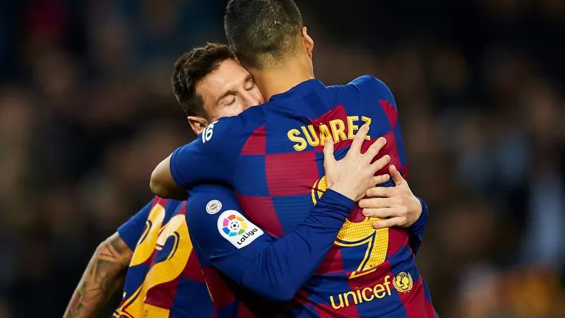 Luis Suárez y Leo Messi celebran un gol del Barça