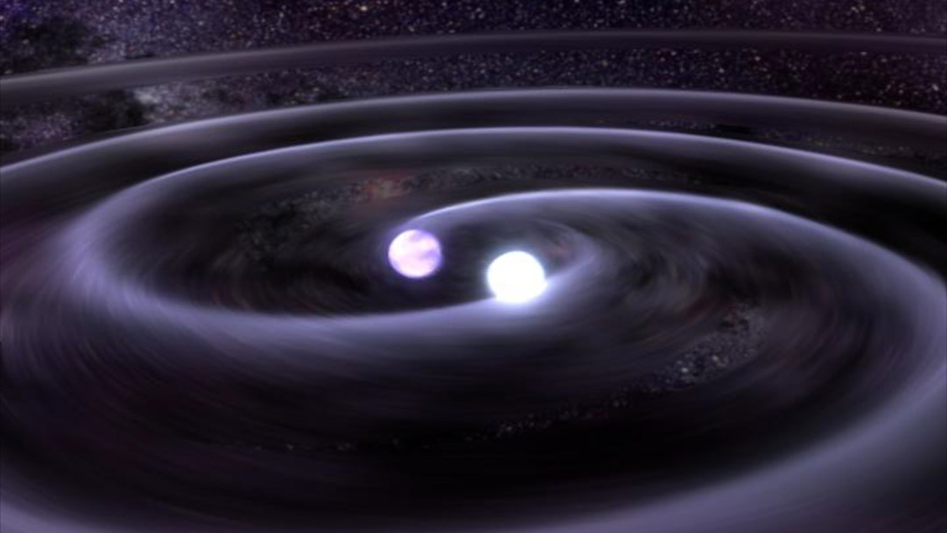 Las estrellas de un sistema binario se acercan por la emision de ondas gravitatorias