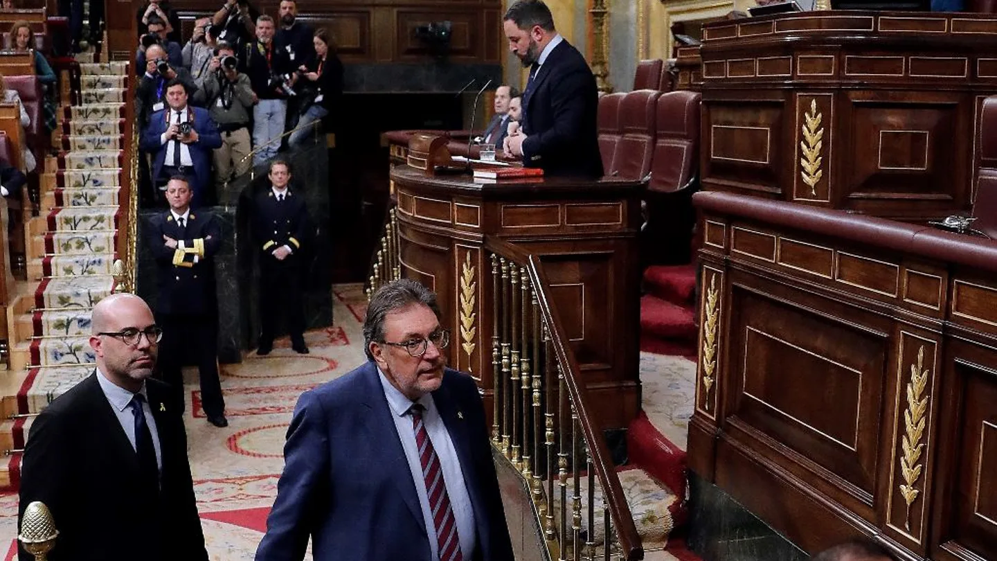 El presidente de Vox, Santiago Abascal, interviene ante el pleno mientras varios diputados abandonan el hemiciclo del Congreso El presidente de Vox, Santiago Abascal, interviene ante el pleno mientras varios diputados abandonan el hemiciclo del Congreso