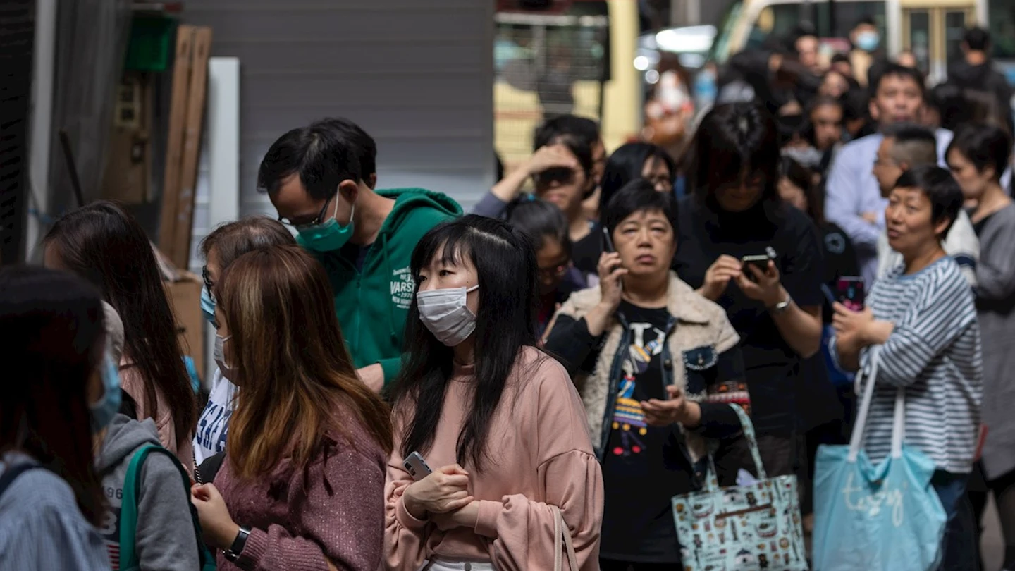 Imagen de ciudadanos en China con mascarillas por el coronavirus Imagen de ciudadanos en China con mascarillas por el coronavirus