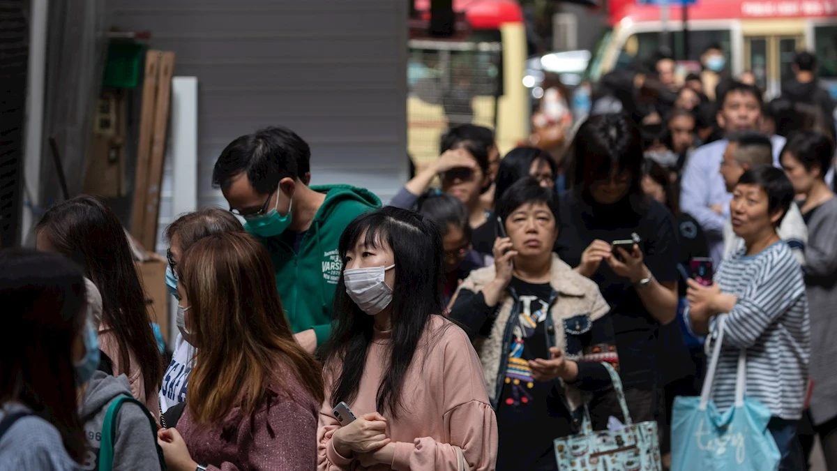 Imagen de ciudadanos en China con mascarillas por el coronavirus