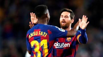 Ansu Fati y Leo Messi