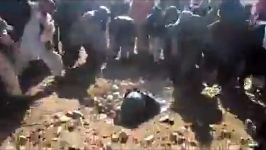 Imagen de la mujer lapidada en Afganistán Imagen de la mujer lapidada en Afganistán