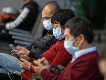 Imagen de personas con mascarillas para protegerse del coronavirus