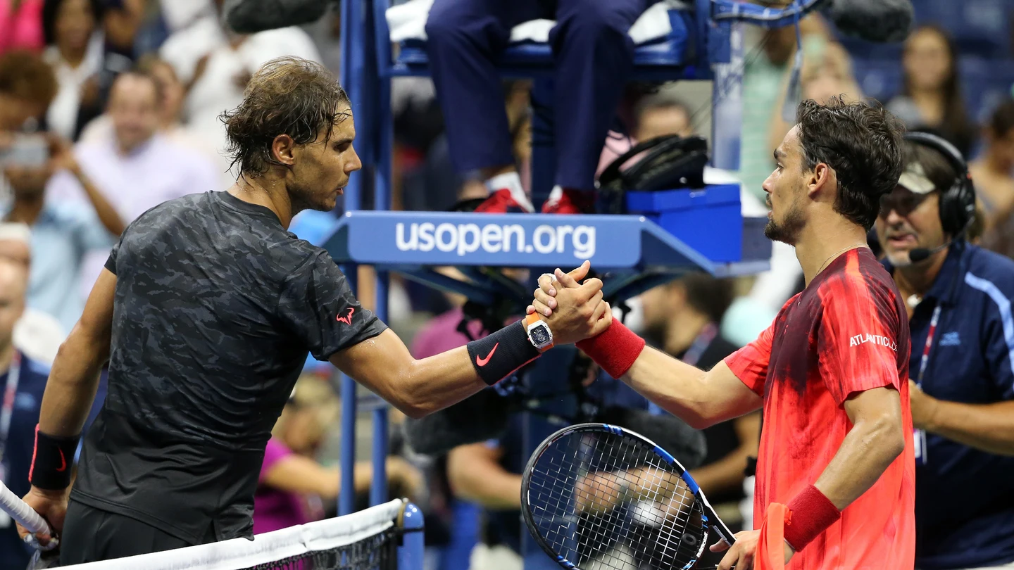 Rafa Nadal y Fabio Fognini en un partido de tenis Rafa Nadal y Fabio Fognini en un partido de tenis