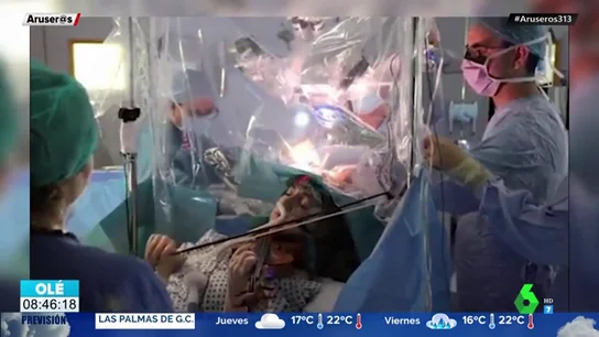 El impactante vídeo de una mujer tocando el violín mientras la extirpan un tumor cererbral El impactante vídeo de una mujer tocando el violín mientras la extirpan un tumor cererbral