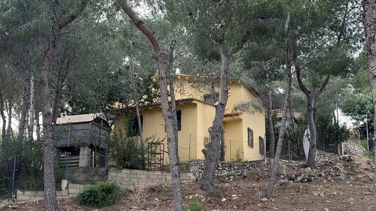El domicilio de Villanueva de Castellón en el que fue asesinada la mujer. El domicilio de Villanueva de Castellón en el que fue asesinada la mujer.