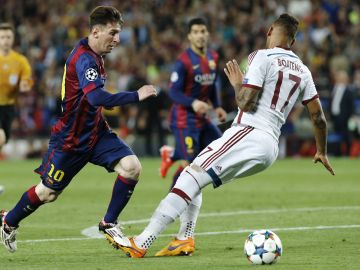 Leo Messi y Jerome Boateng Leo Messi y Jerome Boateng
