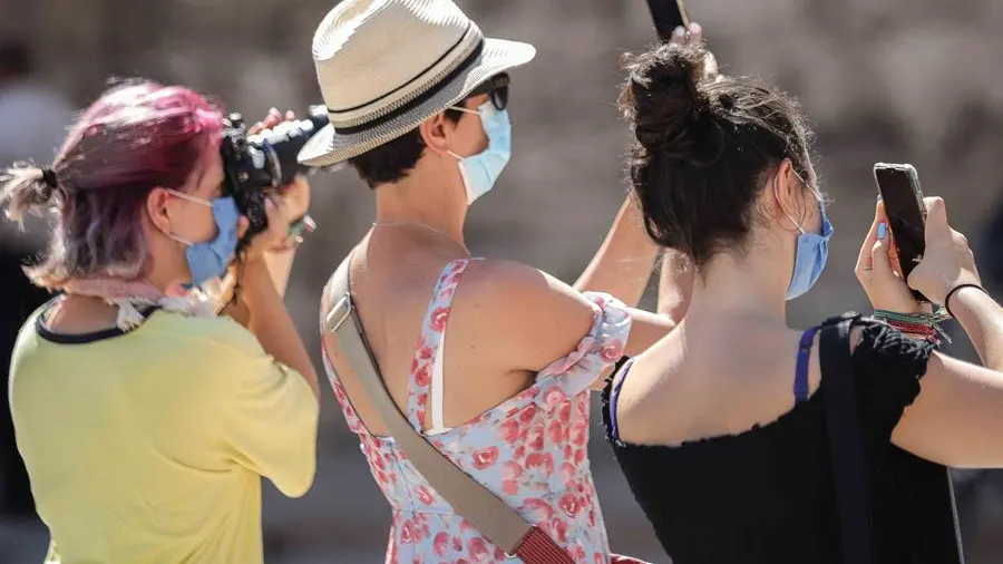 Turistas tomando fotos en Valencia