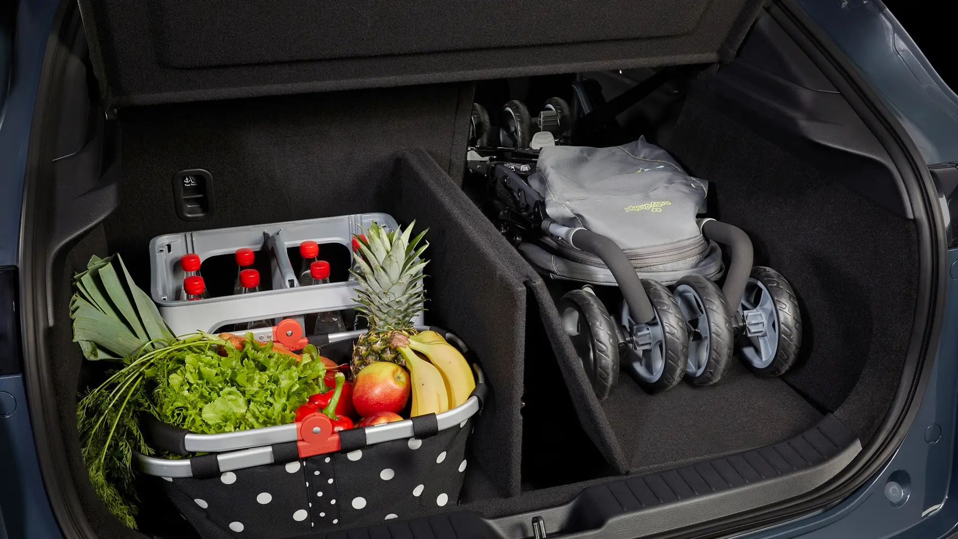 Con el 'Smart Cargo Board' Mazda promete que será más fácil organizar nuestro maletero