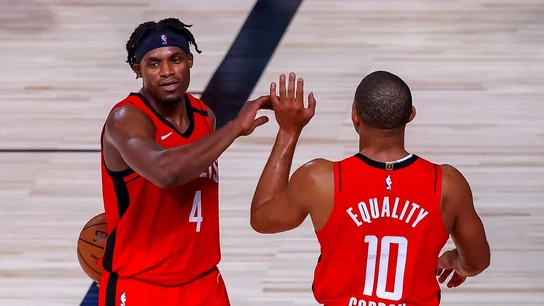 Danuel House, a la izquierda Danuel House, a la izquierda