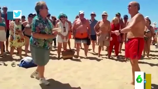 La batalla de gallos entre una señora y un hombre en la playa que revoluciona Twitter La batalla de gallos entre una señora y un hombre en la playa que revoluciona Twitter