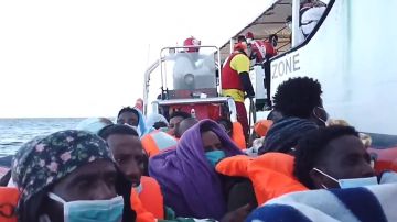 Migrantes a bordo del Open Arms