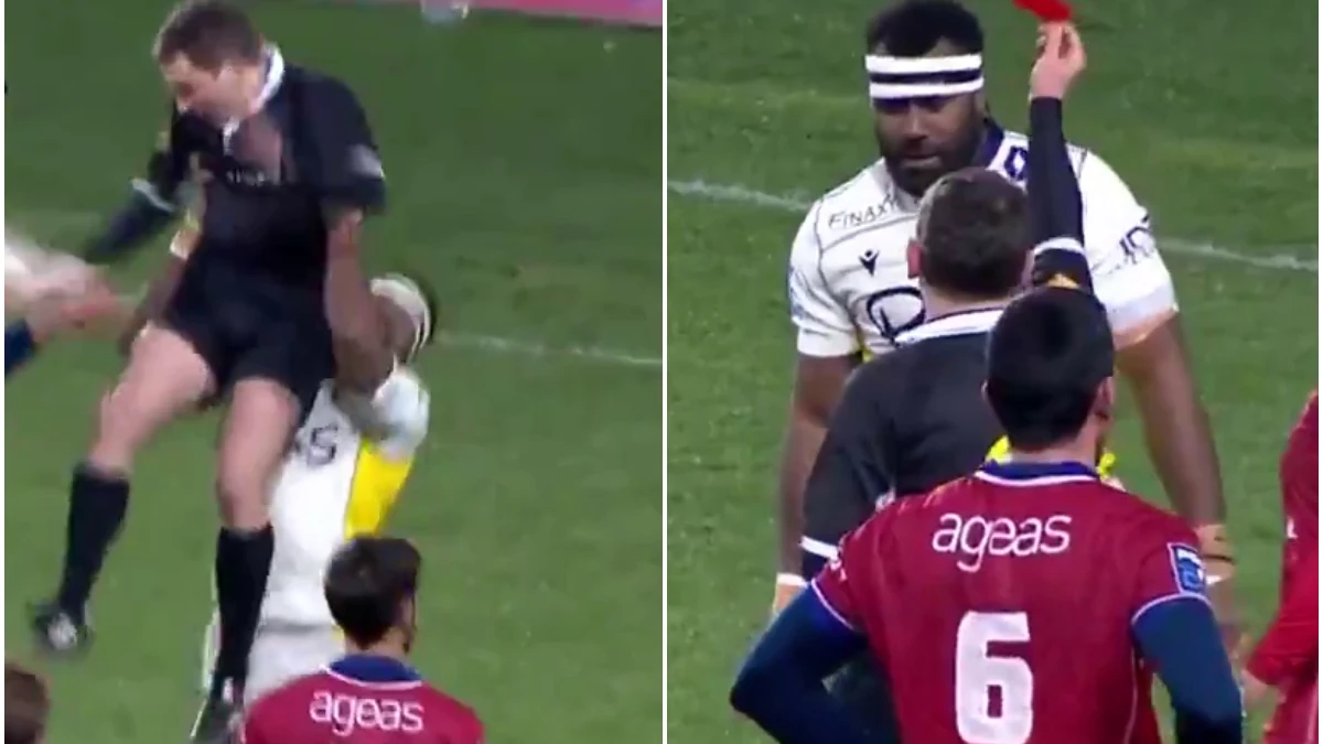 Un jugador de rugby levanta a un árbitro