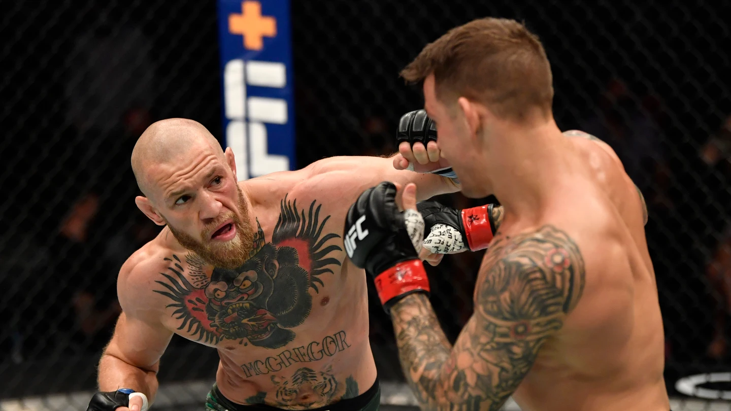 Conor McGregor y Dustin Poirier en el combate UFC 257 Conor McGregor y Dustin Poirier en el combate UFC 257