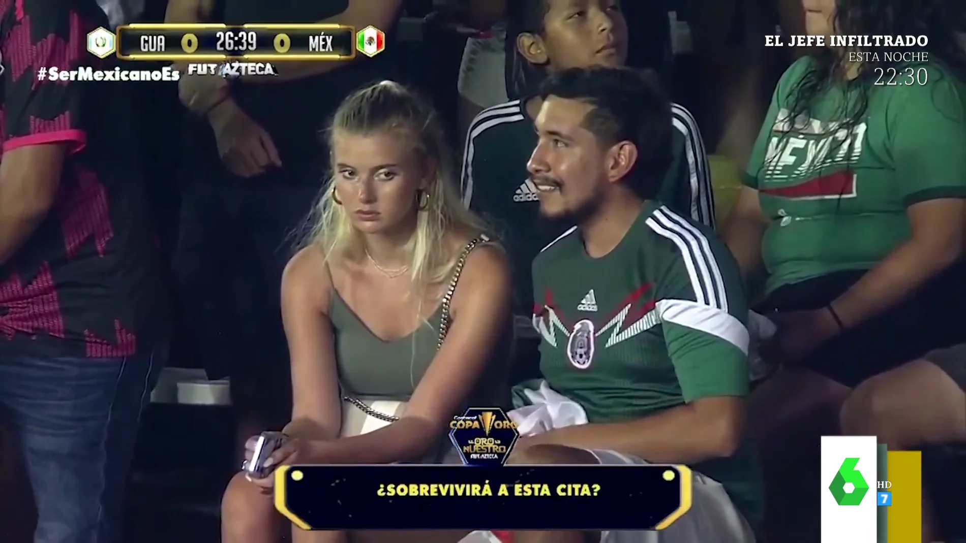 El viral de la cara de aburrimiento de una joven en una cita con su novio en pleno partido de Guatemala y México