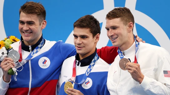 Murphy, a la derecha, con la medalla de bronce Murphy, a la derecha, con la medalla de bronce