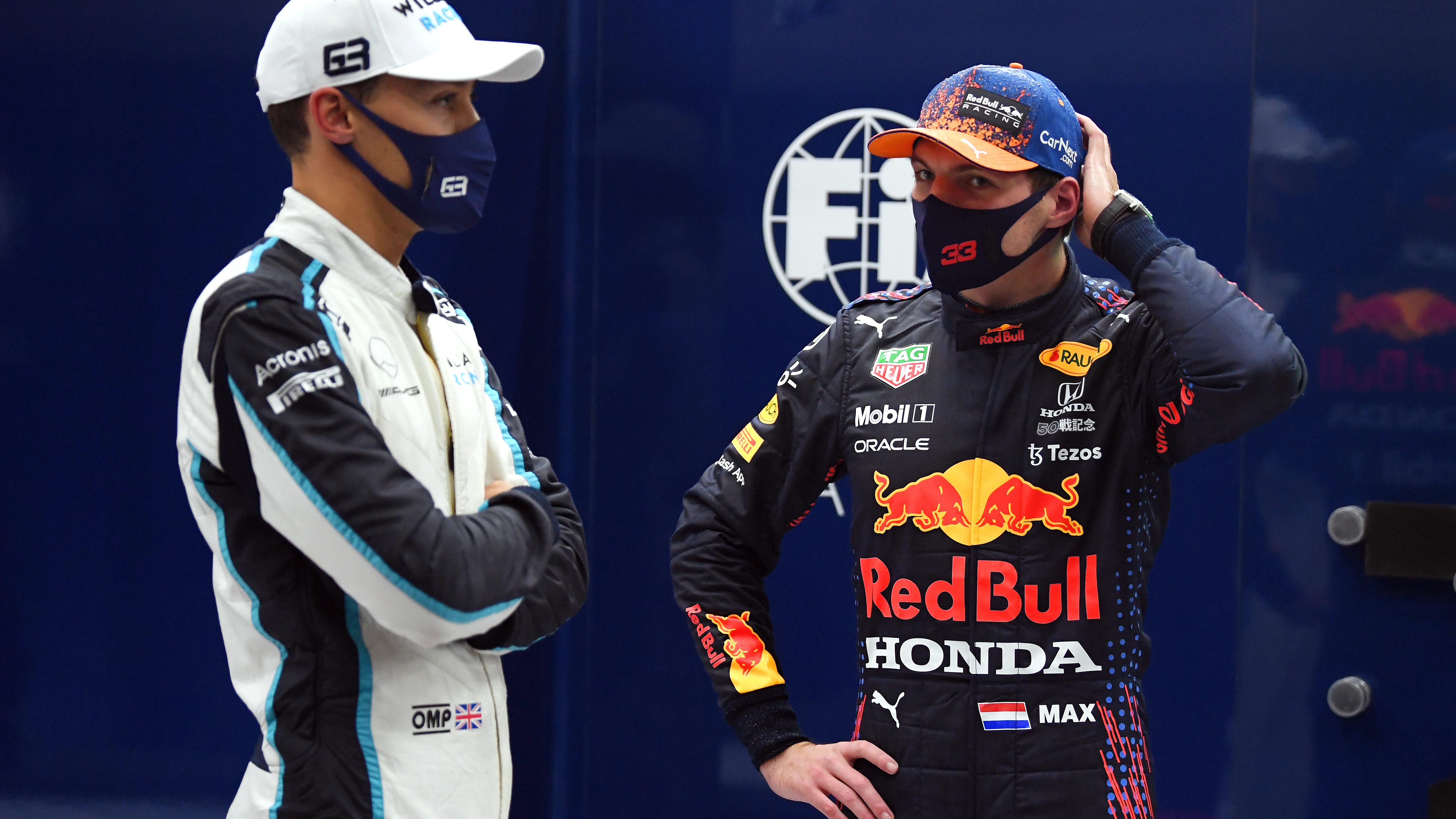 George Russell y Max Verstappen