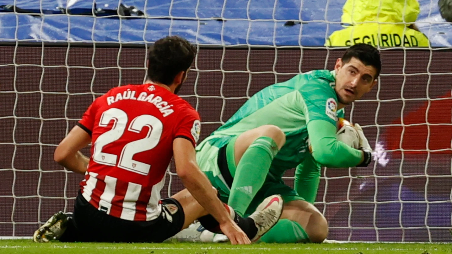 Raúl García y Thibaut Courtois Raúl García y Thibaut Courtois