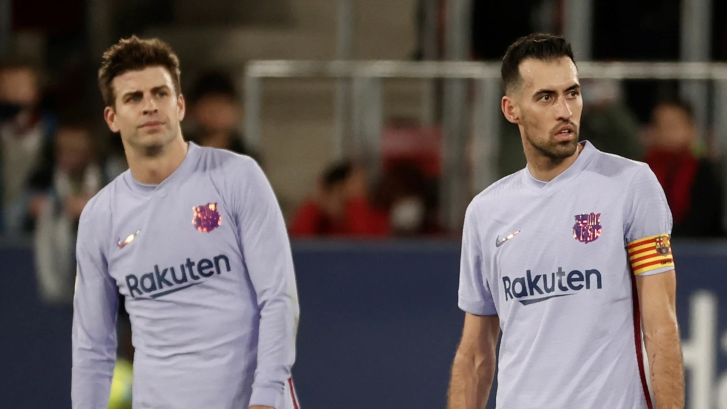 Busquets y Piqué, cariacontecidos Busquets y Piqué, cariacontecidos