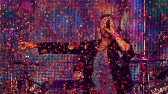 Chris Martin de Coldplay durante un concierto Chris Martin de Coldplay durante un concierto