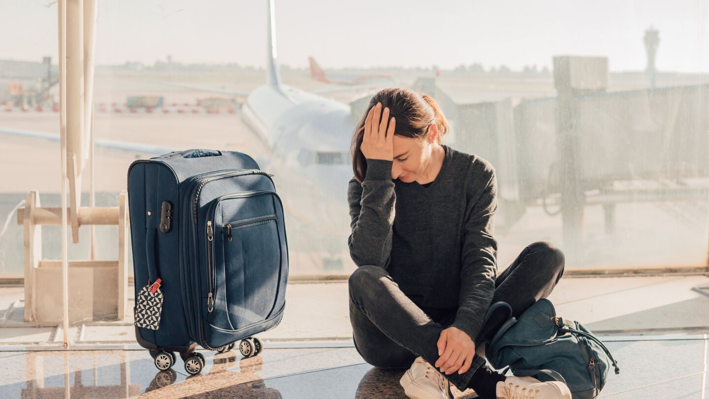 Imagen de archivo de una mujer en el aeropuerto