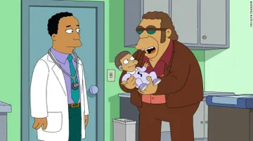 Murphy 'Encías Sangrantes' con su hijo Monk cuando era un bebé.
