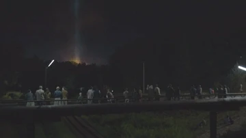 La población de Pripyat observando, sin saberlo, el principio del desastre nuclear más grave de la historia.