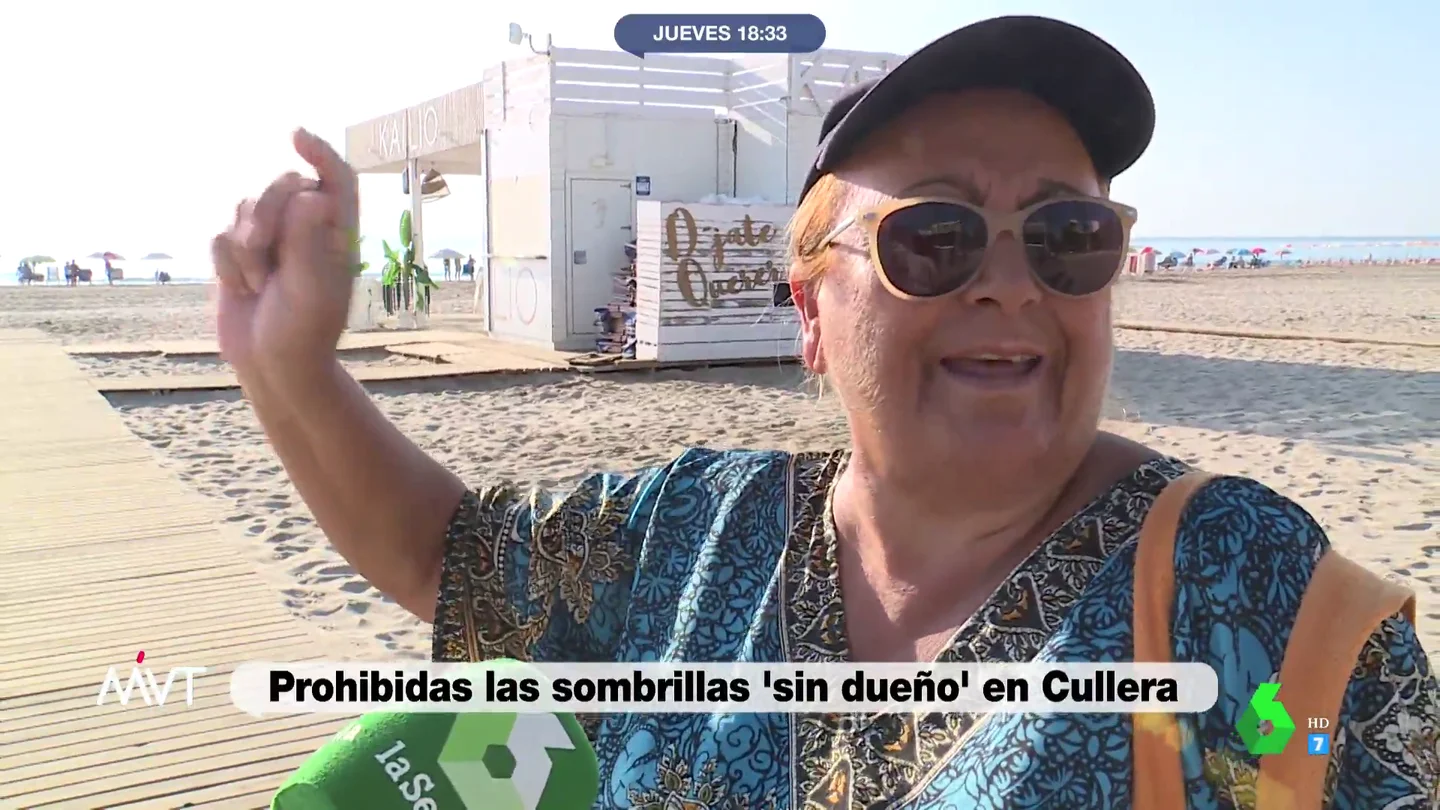 "Tengo que ir a despertar a mis nietos, ¿cómo me voy a quedar ahí?": así amanece Cullera en el primer día de 'guerra' a las sombrillas sin dueño "Tengo que ir a despertar a mis nietos, ¿cómo me voy a quedar ahí?": así amanece Cullera en el primer día de 'guerra' a las sombrillas sin dueño
