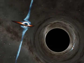 Simulación en la que un agujero negro más pequeño, a la izquierda, se curva alrededor de otro más grande Simulación en la que un agujero negro más pequeño, a la izquierda, se curva alrededor de otro más grande