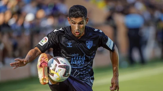 Juanfran, durante un partido con el Málaga Juanfran, durante un partido con el Málaga