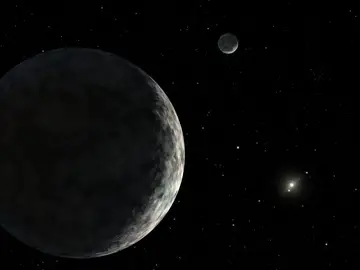 Representación del planeta enano Eris y su luna Dysnomia. Al fondo se situaría el Sol Representación del planeta enano Eris y su luna Dysnomia. Al fondo se situaría el Sol