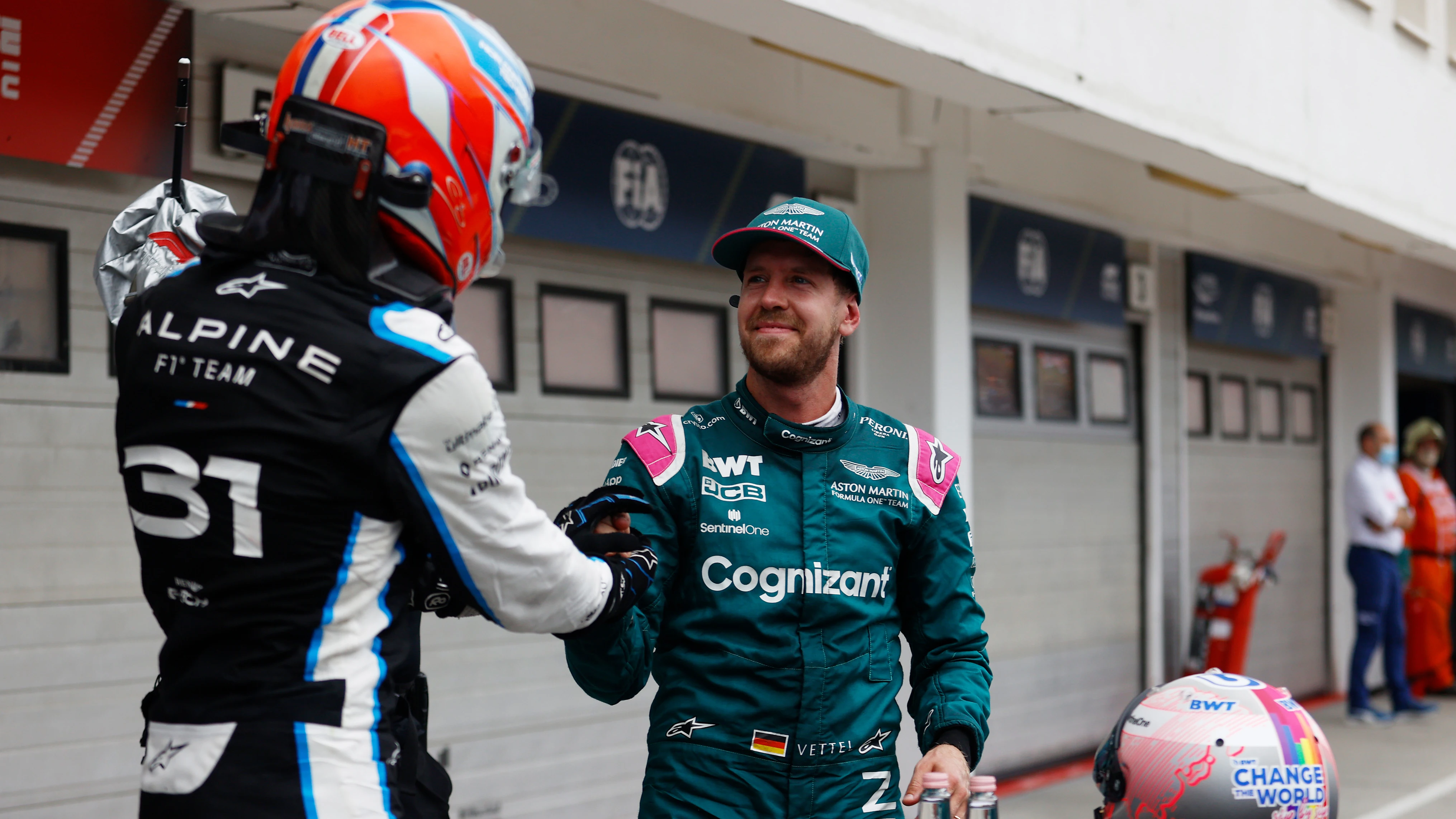 Esteban Ocon y Sebastian Vettel