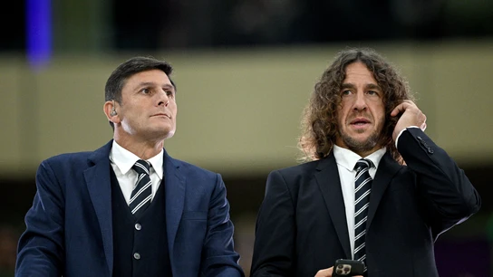 Zanetti junto a Puyol Zanetti junto a Puyol