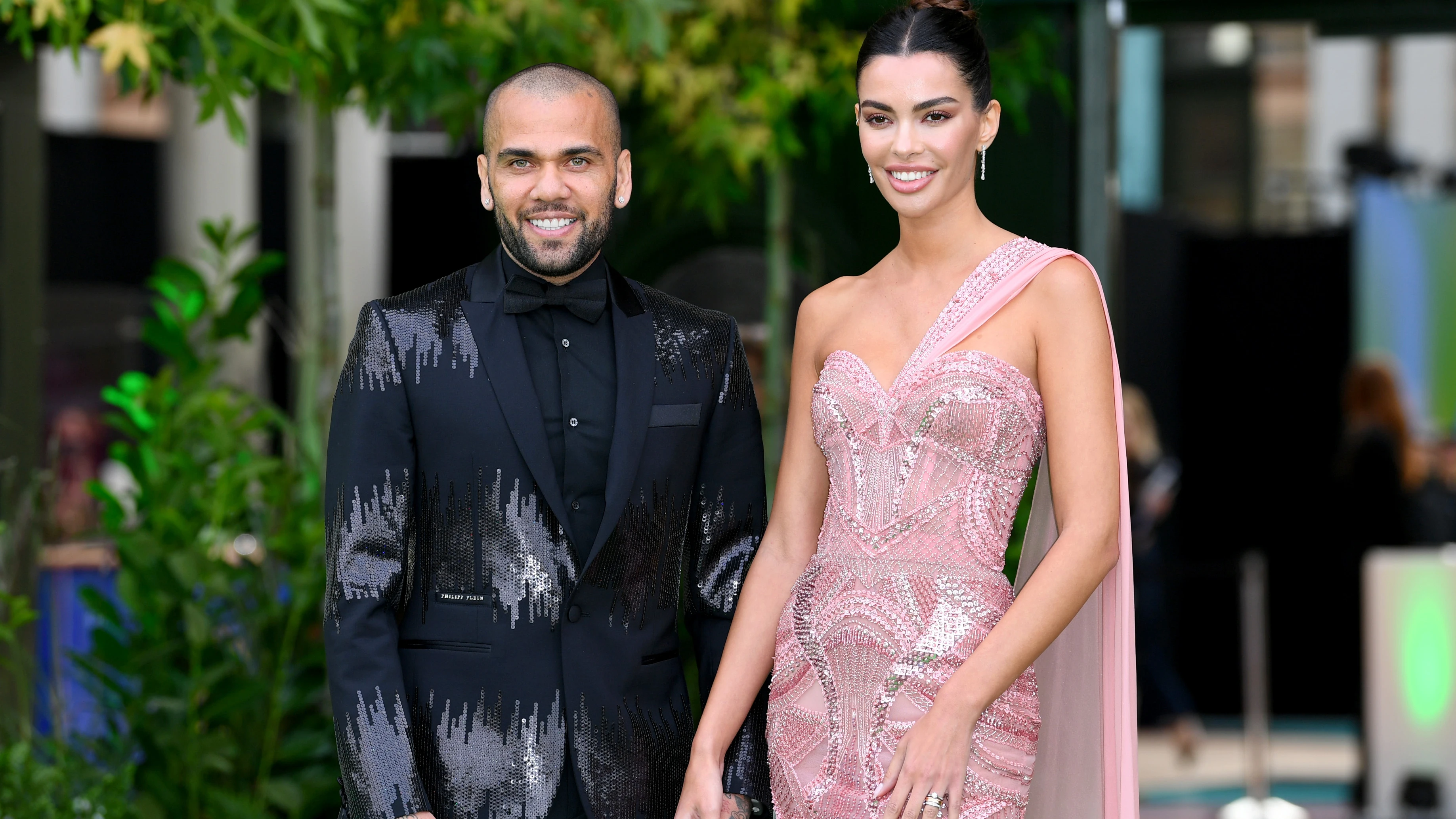 Dani Alves y Joana Sanz, durante un evento en Londres en 2021