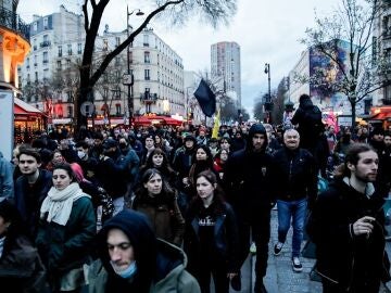 At least 100 arrested in a new night of protests against the pension reform in France