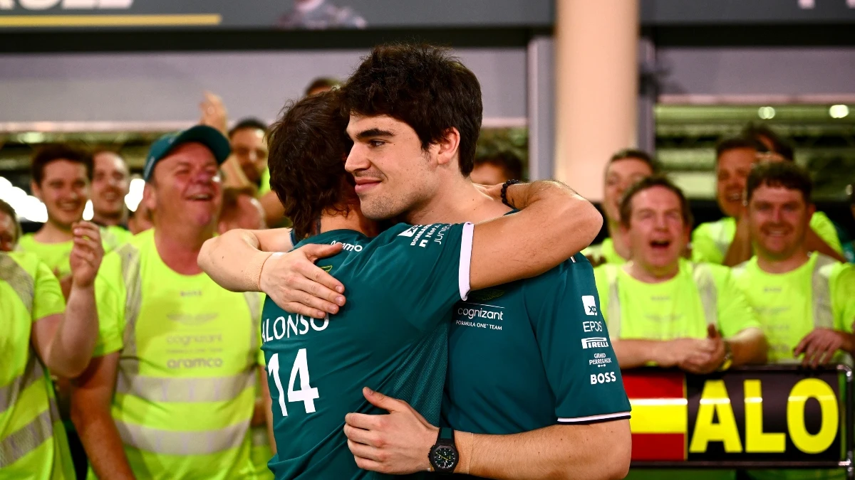 Fernando Alonso se abraza a Lance Stroll