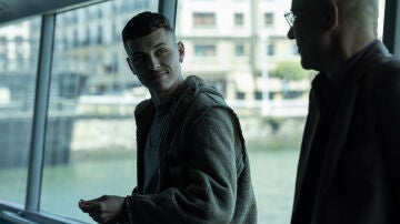 Sergio's character (Arón Piper) chats with Nathanael (Ramiro Blas) on the suspension bridge in a scene from 'El silencio'.
