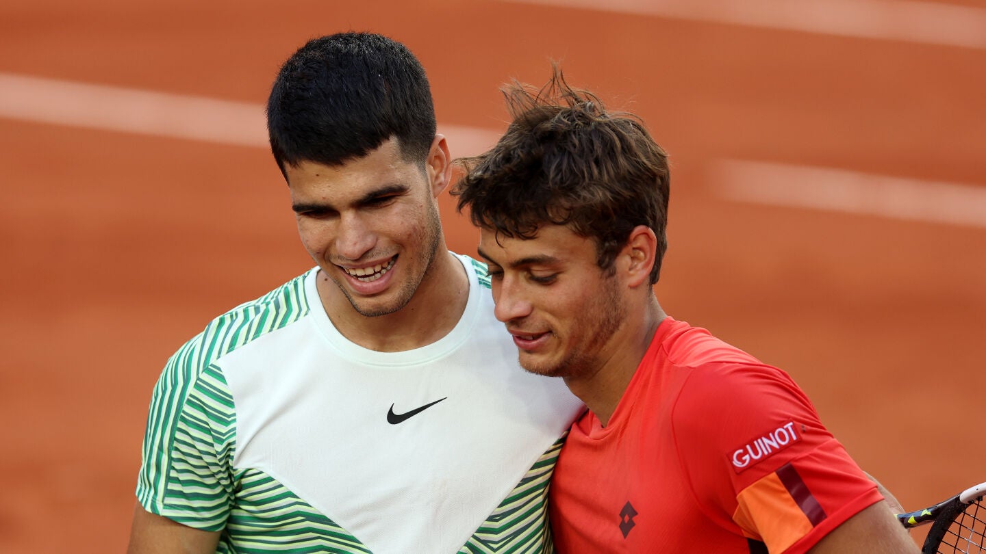 Carlos Alcaraz y Flavio Coboli